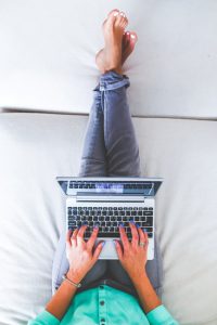 hands-woman-legs-laptop-large